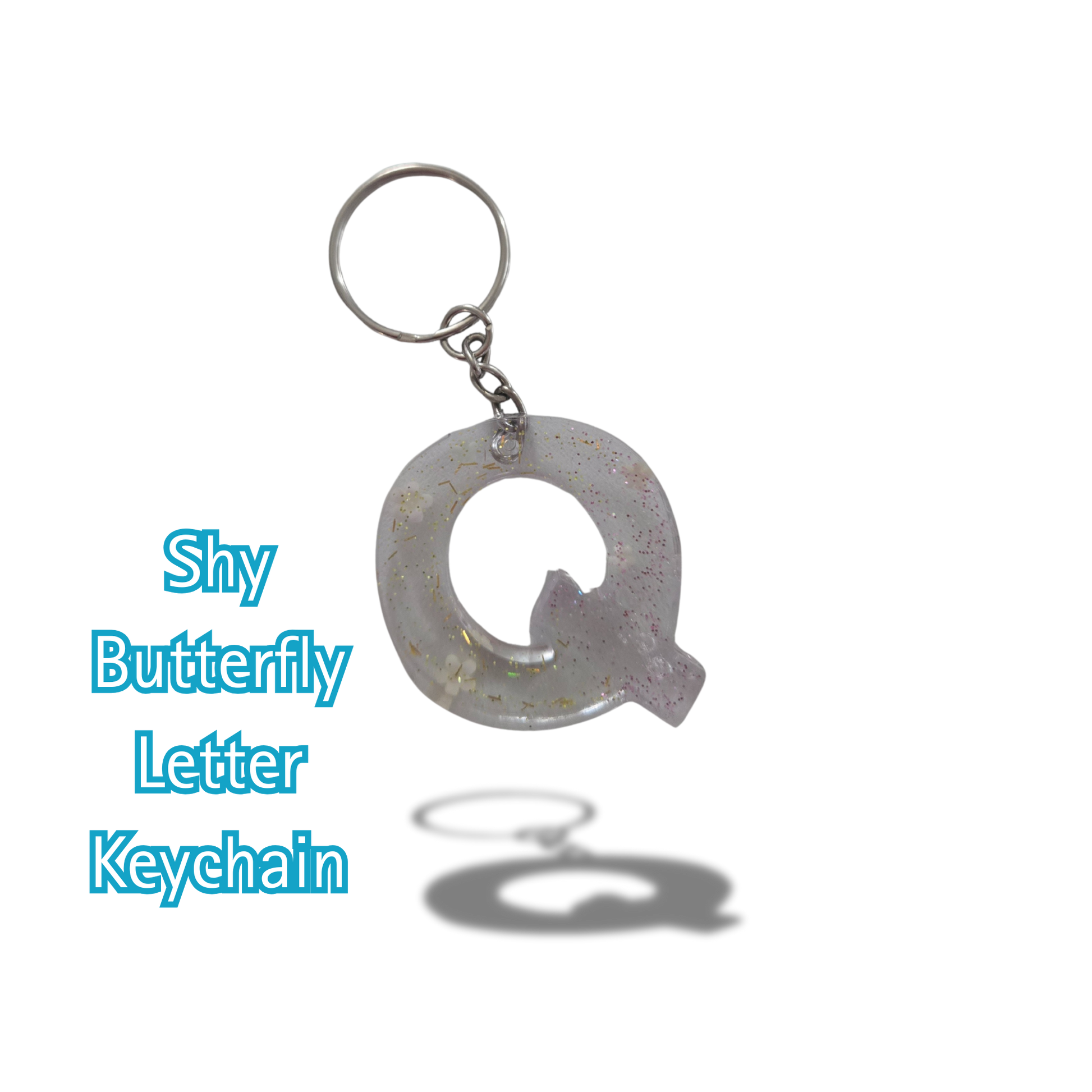 Keychain with letter 'Q' design on a white background