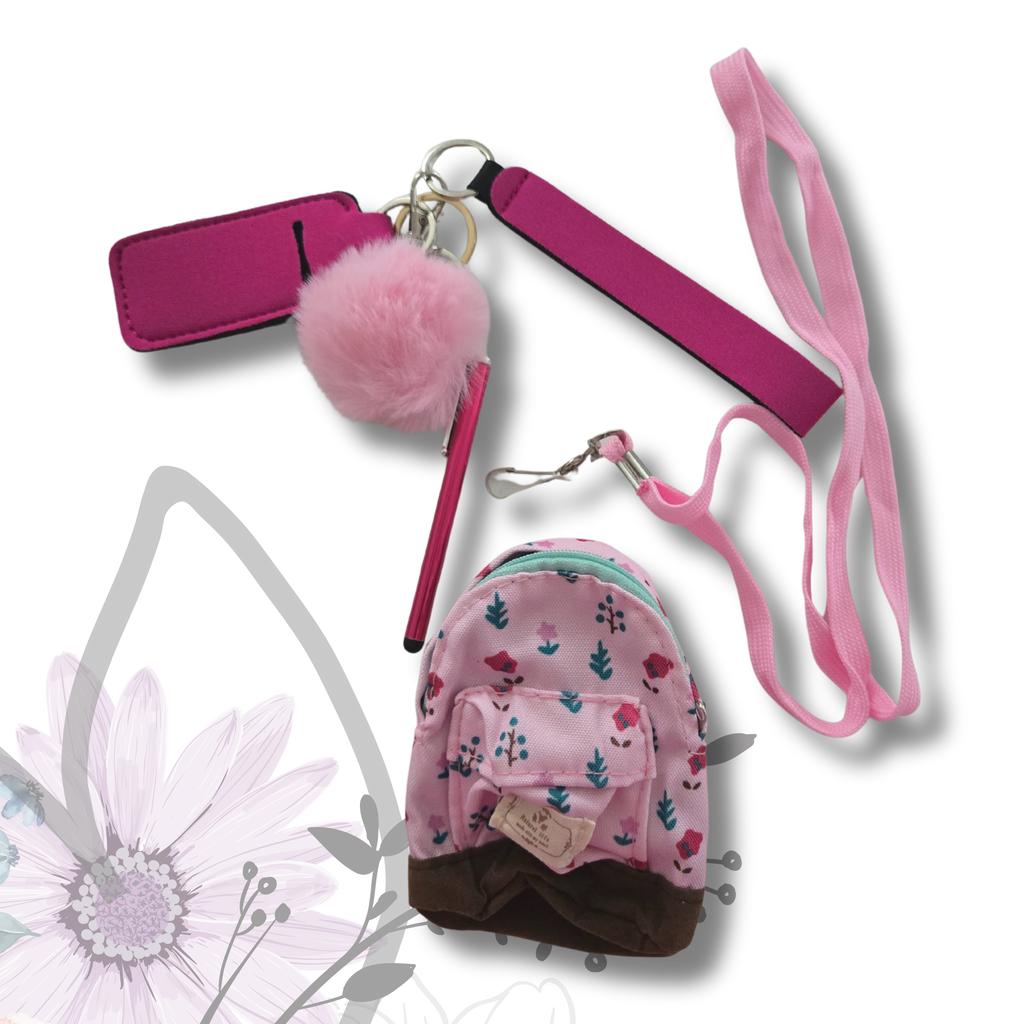 Pink pet leash, collar, and pouch with floral design on a white background